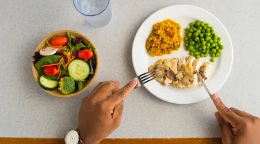 a small bowl of salad and plate of healthy food photograph from above