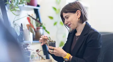 Giulia Guidetti looking at plant