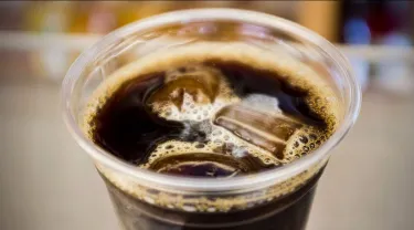 A cup of iced black coffee