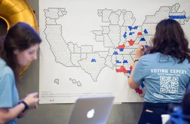 Tufts students updating an electoral map