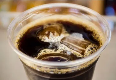 A cup of iced black coffee